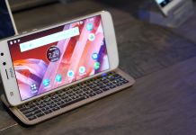 Fysiskt tangentbord och Polaroid-skrivare i mobilen